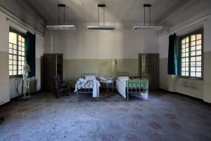 Two beds in grungy hospital